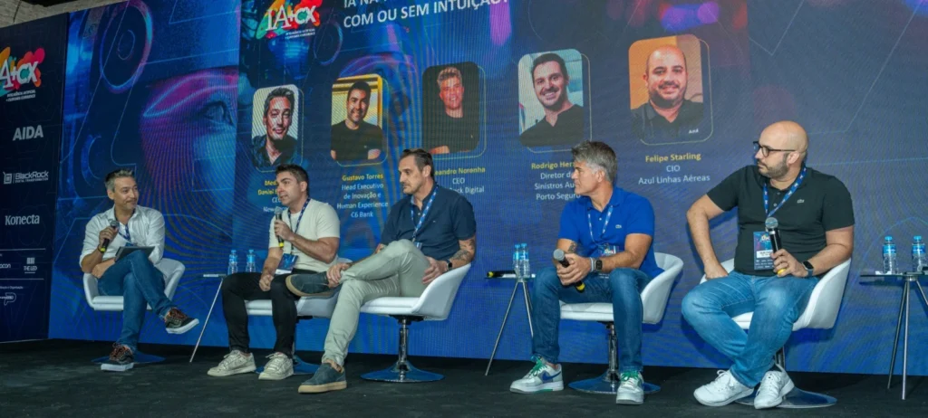 Foto do painel "IA na tomada de decisão, com ou sem intuição?, no IA+CX.