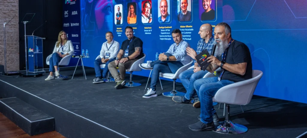 Painel “CX preditivo: como a IA antecipa as necessidades dos clientes?”. 